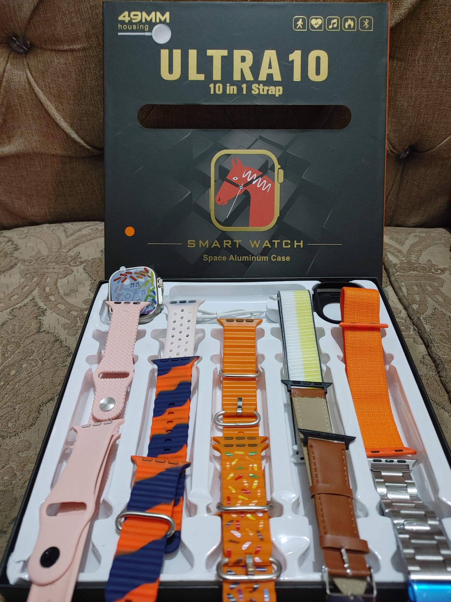 Box of Ultra10 smart watch straps with various colored straps displayed.