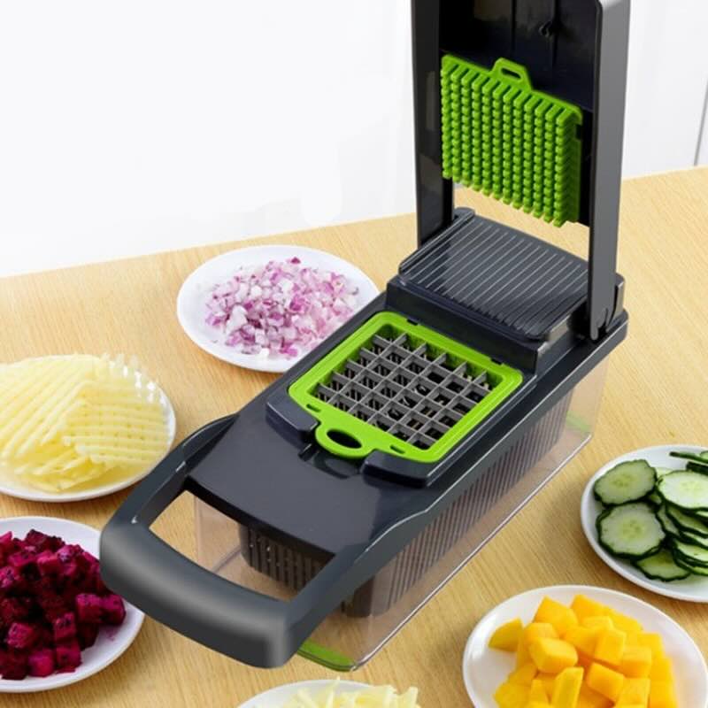 Multifunctional vegetable chopper with various sliced vegetables on a wooden table