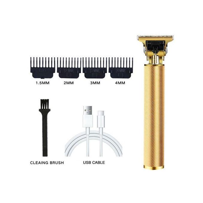 Gold hair trimmer with attachments including a comb, cleaning brush, and USB cable on a white background.