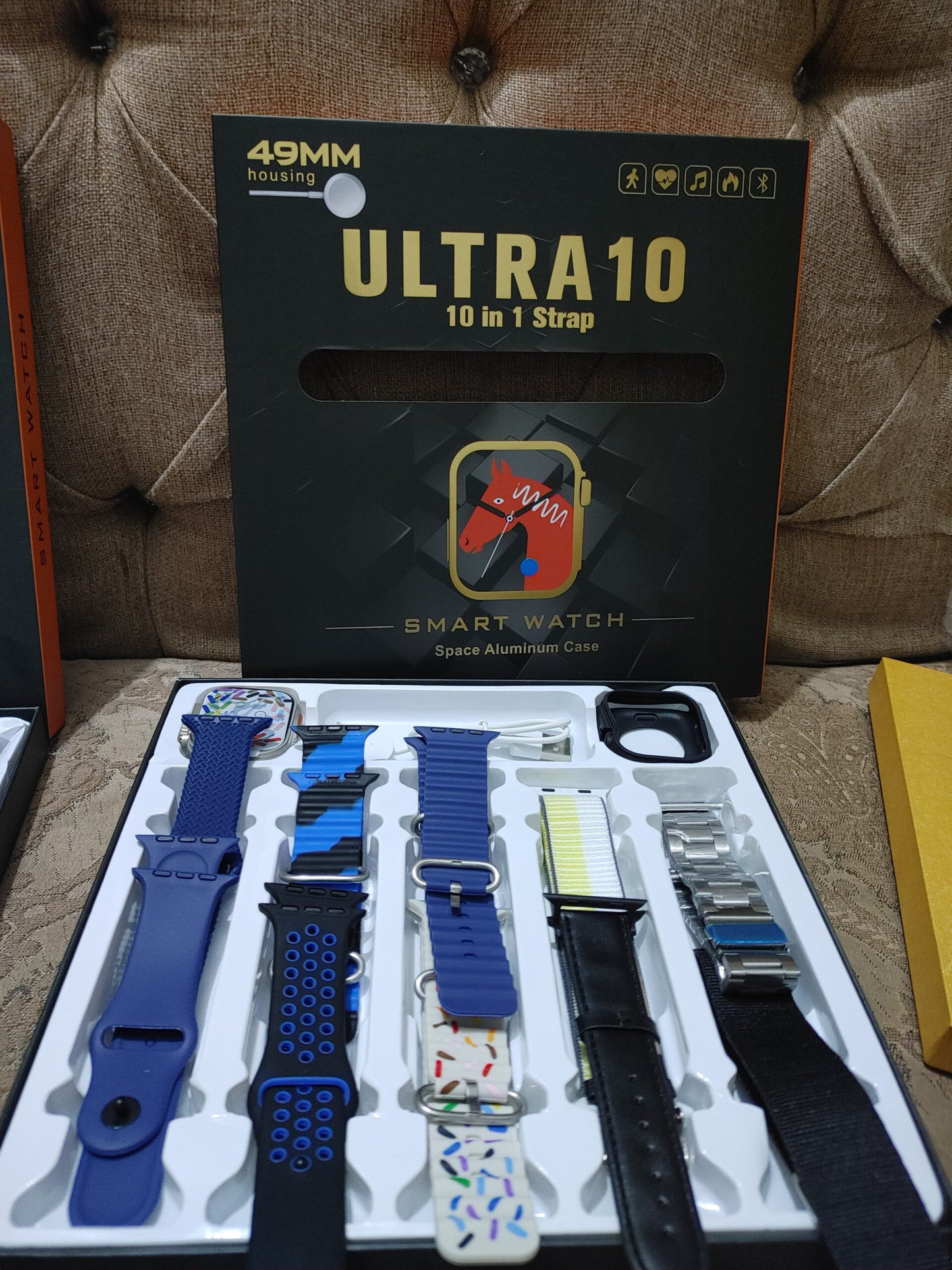 Box of Ultra10 smart watch straps on a textured surface