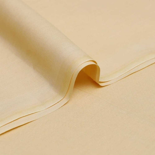 Beige fabric with a slight texture and fold