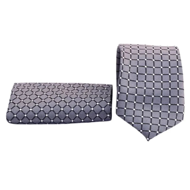 Gray patterned tie and pocket square set on a white background
