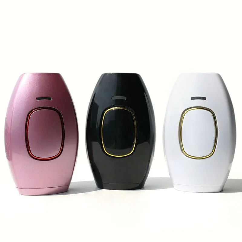 Three electronic devices in pink, black, and white on a white background