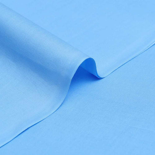 Men’s Unstitched sky blue Hard Plain Cotton Close-up of blue fabric with a slight wave pattern