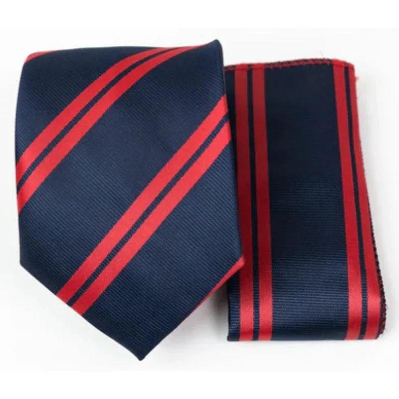 Navy blue tie with red stripes and matching pocket square on a white background